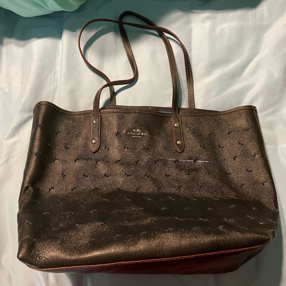 Coach tote with butterflies.